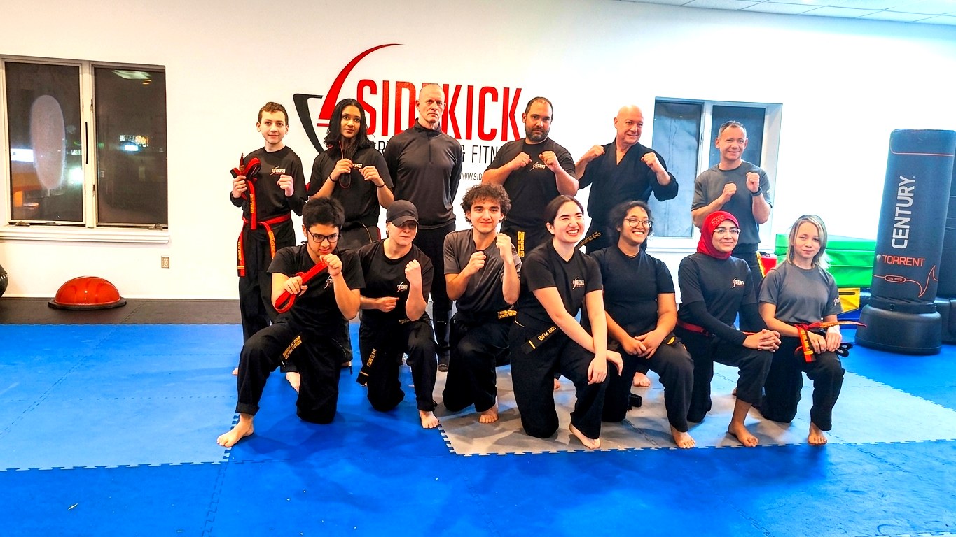 Sidekick Martial Arts group photo with instructors and students